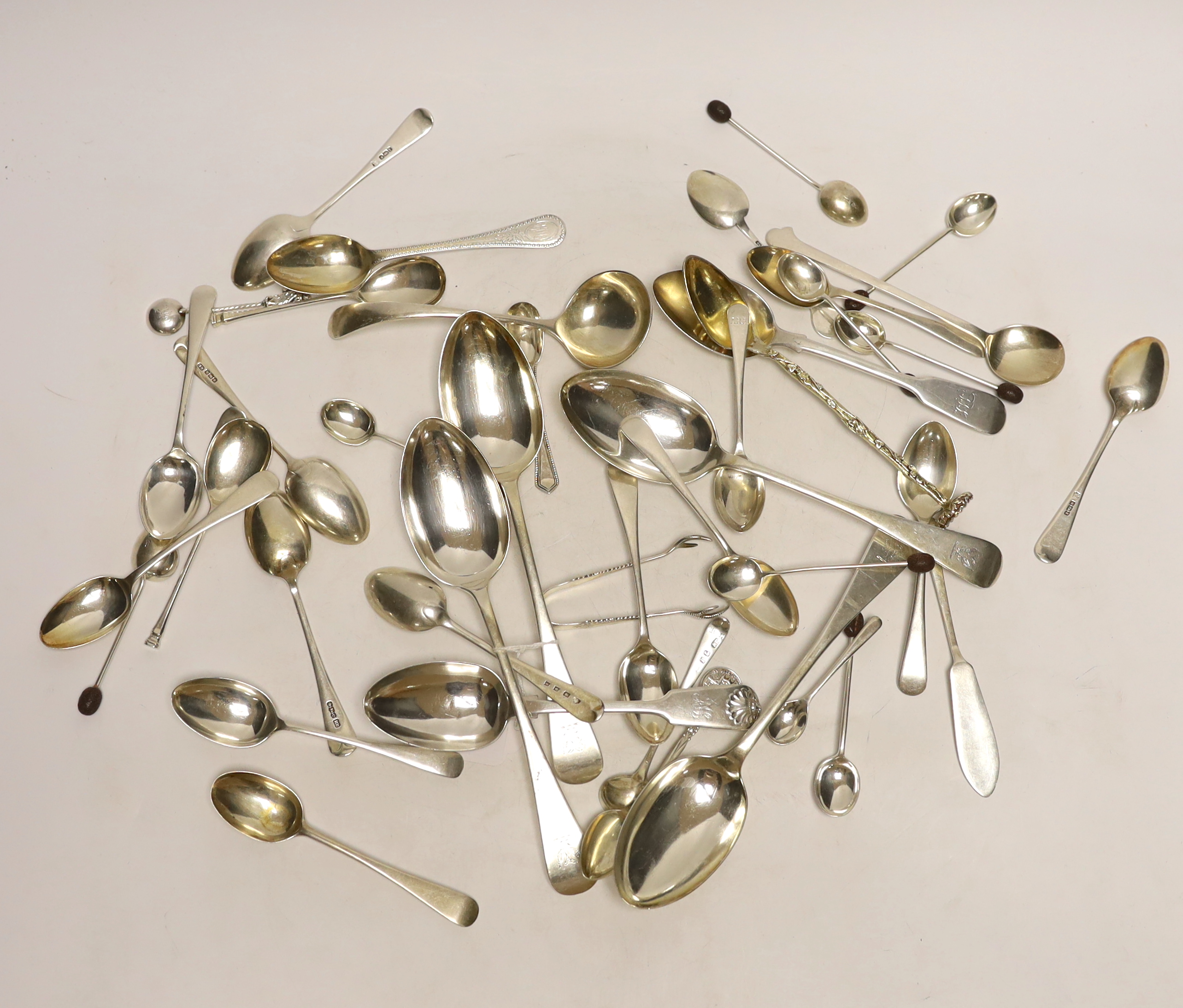 A quantity of assorted mainly silver flatware including teaspoons, table spoons, condiment spoons etc.